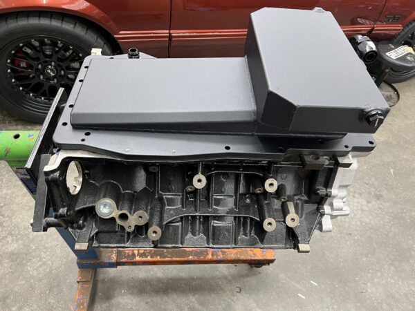 Shallow front sump 7.3 Godzilla oil pan for use with Holley timing cover and oil pump.